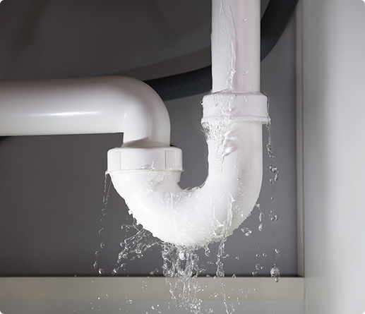 emergency-water-damage-repair Pipe under sink leaking water